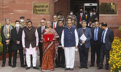 Union Finance Minister Nirmala Sitharaman with her team ahead of budget presentation on Tuesday. (Photo | Shekhar Yadav/EPS)