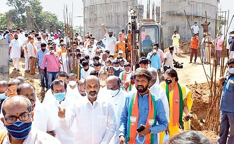 BJP State president Bandi Sanjay Kumar inspects the ongoing work on the 125-ft tall BR Ambedkar statue along with party leaders in Hyderabad on Sunday.