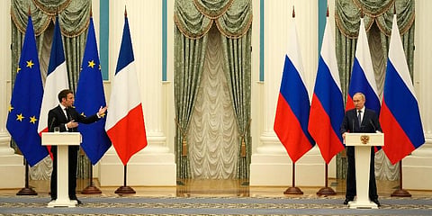 Russian President Vladimir Putin, right, listens during a joint press conference with French President Emmanuel Macron after their talks Monday, Feb. 7, 2022 in Moscow. (Photo | AP)