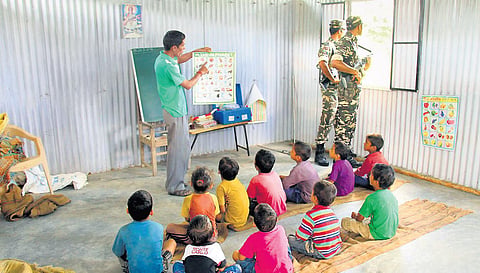 SSB jawans keep a watch at India-Nepal border from a classroom. (Photo | Vineet Upadhyay)