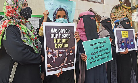 Women wearing burqa protest against the ban on headscarves, in Bengaluru. (File Photo | Vinod Kumar T, EPS)