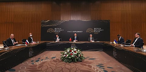 Turkish Foreign Minister Mevlut Cavusoglu, center, chairs a tripartite meeting with Russia's Foreign Minister Sergey Lavrov, left, and Ukraine's Foreign Minister Dmytro Kuleba, right(Photo | AP)