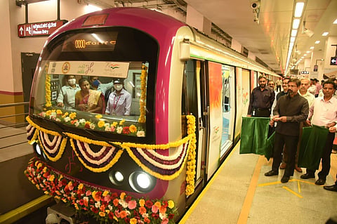 BMRCL Managing Director Anjum Parwez flagging off Bengaluru Metro's first vinyl wrapped train from Kempegowda Metro station to Kengeri Road station (Photo | Nagaraj Gadekal)