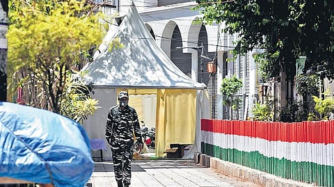 A CRPF personnel patrols outside the cordoned off area at Tablighi Jamaat’s Nizamuddin Markaz. (File Photo| Parveen Negi, EPS))