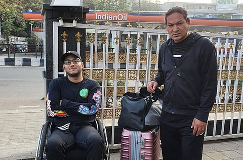 Abhishek Chamoli with coach Hukam Singh Rawat *Right). (Photo | Special Arrangement)