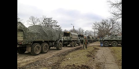 A convoy of military trucks parked in a street in Mykolaivka, Donetsk region, the territory controlled by pro-Russian militants, eastern Ukraine. Representational Image (File Photo | AP)