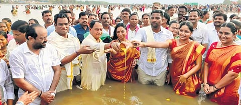 Endowments Minster A. Indrakaran Reddy, Government Whip Balka Suman, Collector Bharati Holikeri, MLC Dhande Vithal and others take a holy dip in the Pranahita river in Mancherial district marking the