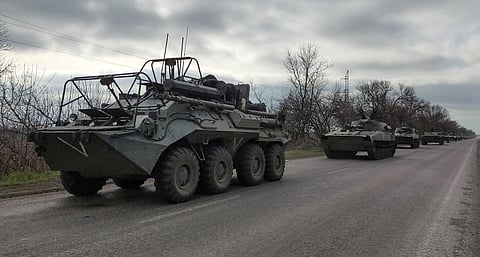 A Russian military convoy moves on a highway in an area controlled by Russian-backed separatist forces near Mariupol, Ukraine. (Photo |AP)
