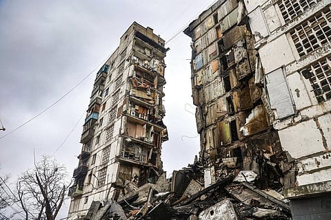 A building damaged during fighting is seen in Mariupol. (File Photo | AP)