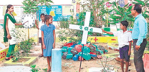 Subash with school students in the park | Express