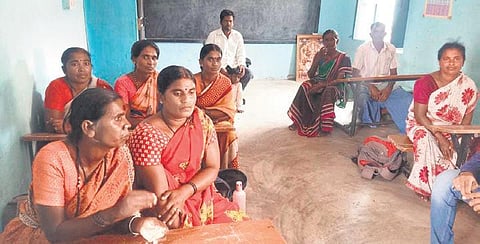 The group of women who cleared the feeder canals of the two lakes in a village in Kolar district. (Photo| EPS)
