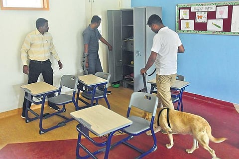 The bomb disposal and dog squads conduct a search at Redbridge International School after many educational institutions across Bengaluru received bomb threats on Friday | Ashishkrishna HP