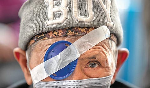 An elderly Nepalese patient waits for his eye patch to be removed at the Tilganga Eye Center in Kathmandu (File Photo|| AP)
