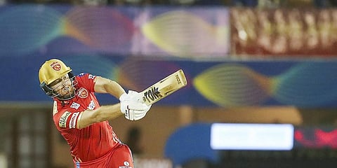 Jonny Bairstow of Punjab Kings hits for a six during the IPL match against Royal Challengers Bangalore May 13, 2022.(Photo | PTI)