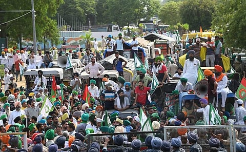 Farmers of the Sanyukt Kisan Morcha protest near Chandigarh-Mohali border after being stopped from heading towards Chandigarh, in Mohali. (Photo | PTI)