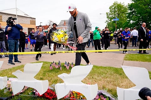 Buffalo Bills' Josh Allen visits the scene of Saturday's shooting at a supermarket, in Buffalo. ( File Photo)