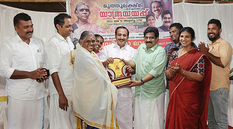 Kozhikode MP M K Raghavan and MLA M K Muneer honouring Muthulakshmi during her retirement function.