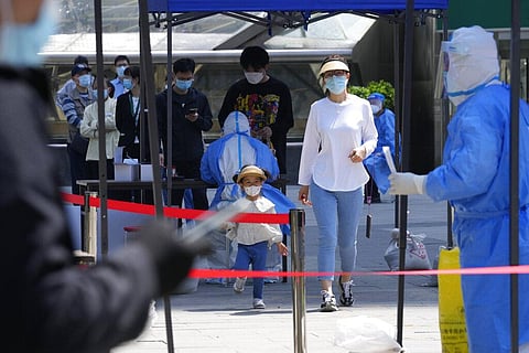 Beijing closes 10 per cent of subway stations to stem Covid spread