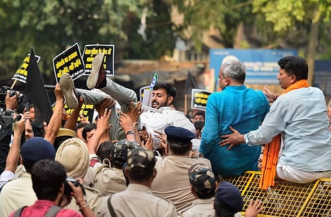 BJP leaders demonstrate against arrest of party spokesperson Tajinder Pal Singh Bagga, outside AAP office in New Delhi, Friday, May 6, 2022. (Photo | PTI)
