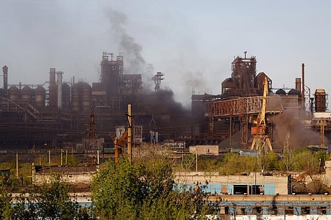 Smoke rises from the Metallurgical Combine Azovstal in Mariupol during shelling, in Mariupol, in territory under the government of the Donetsk People's Republic. (Photo | AP)