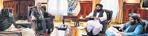 MEA Joint Secretary JP Singh, with Taliban Foreign Minister Amir Khan Muttaqi during a trip of an Indian delegation to Kabul on June 2 | file