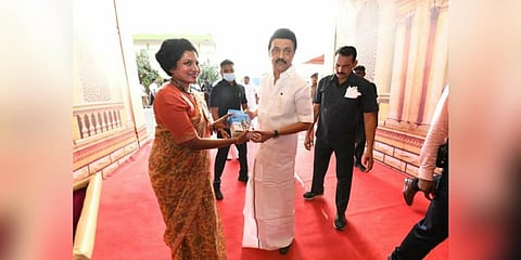 Pudukkottai District Collector Kavitha Ramu gifts CM Stalin a copy of Nivedita Louis’ 'Ariyappadatha Christhavam'.