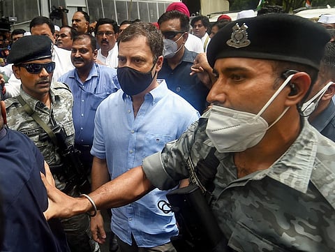 Congress leader Rahul Gandhi leaves for ED office amid protests by party workers, after being summoned for questioning in the National Herald case, in New Delhi, Monday. (Photo | PTI)