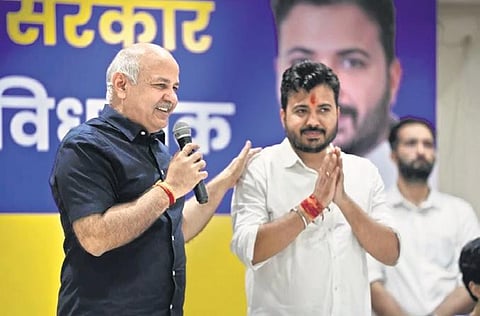 Deputy Chief Minister Manish Sisodia interacts with residents. (Photo | Express)