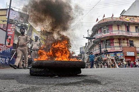 Police personnel patrol amid protests against Centre's 'Agnipath' scheme, in Patna, Friday, June 17, 2022. (Photo | PTI)