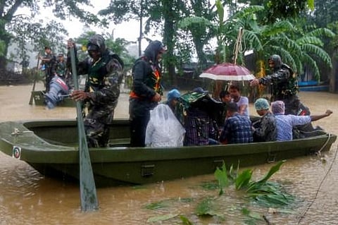 Relentless downpours have inundated the country, troops have been deployed to evacuate households. (Photo | AFP)
