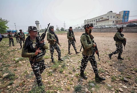 CRPF personnel patrol outside a base camp for pilgrims ahead of the 'Amarnath Yatra 2022', in Jammu, Monday, June 27, 2022.(Photo | PTI)