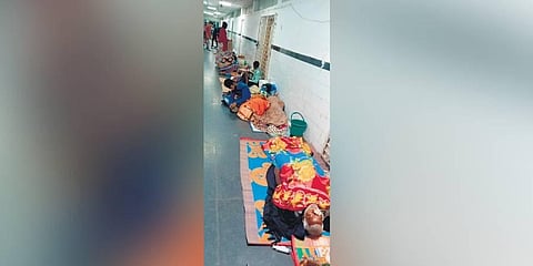 Patients undergoing treatment on corridor floor of a ward | Express