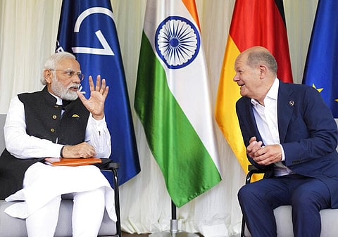 German Chancellor Olaf Scholz, right, speaks PM Modi during a meeting on the sidelines of the G7 summit at Castle Elmau in Kruen, Germany(Photo | AP)