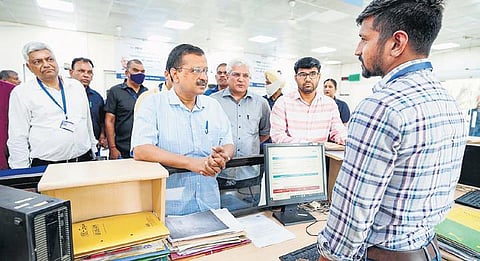 Chief Minister Arvind Kejriwal and Transport Minister Kailash Gahlot at RTO office in Sarai Kale Khan on Thursday | Pti