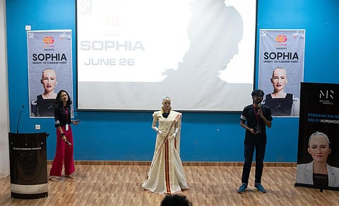 An interactive session with AI humanoid Sophia in progress at College of Engineering - Trivandrum