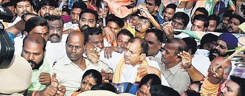BJP activists protest demanding the arrest of those guilty of gang raping a minor girl. (Left) The seized Mercedes parked at the Jubilee Hills police station on Friday
