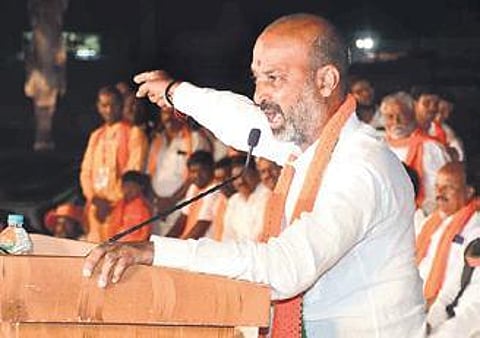 BJP State president Bandi Sanjay addresses a meeting at Narayanpet on Friday. ( Photo | EPS)