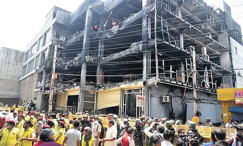 A massive fire broke out in a four-storey building in outer Delhi’s Mundka on May 13, leaving 27 people dead. ( Photo | Parveen Negi, EPS)