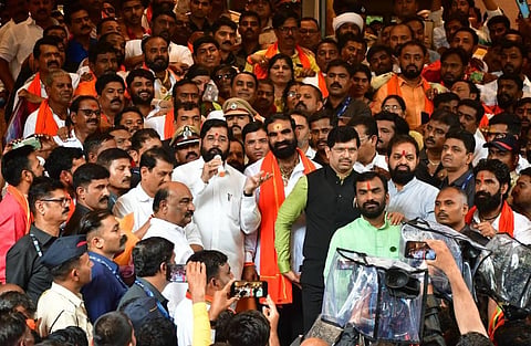 Maharashtra CM Eknath Shinde with Shiv Sena MLA Santosh Bangar during his interaction with his supporters, in Mumbai, Tuesday, July 12, 2022. (Photo | PTI)