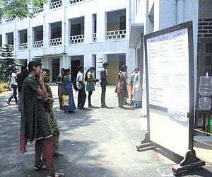 Students queue up at the Ethiraj College for Women, braving the heat. (File photo| EPS)