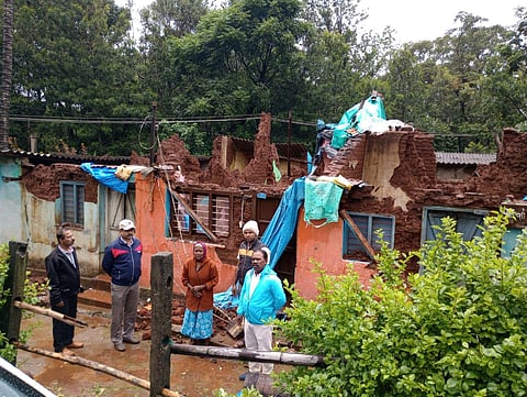 A damaged house in Somwarpet taluk.