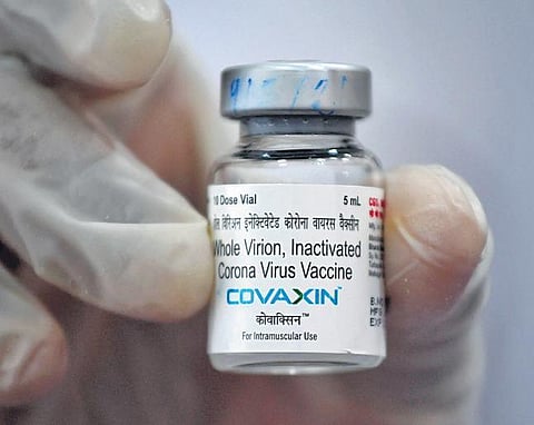 A vial of the Covaxin vaccine displayed by a medical worker. (File photo | AFP)