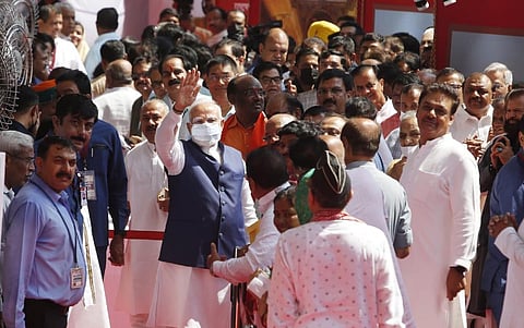 Prime Minister Narendra Modi waves as he comes out after casting his vote at parliament house during the presidential election in New Delhi on Monday. (Photo | Shekhar Yadav/EPS)