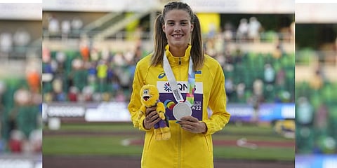 Silver medalist Yaroslava Mahuchikh, of Ukraine, poses on the podium after the women's high jump final at the World Athletics Championships.(Photo | AP)
