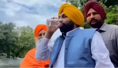 Bhagwant Mann drinks water from from holy rivulet Kali Bein.