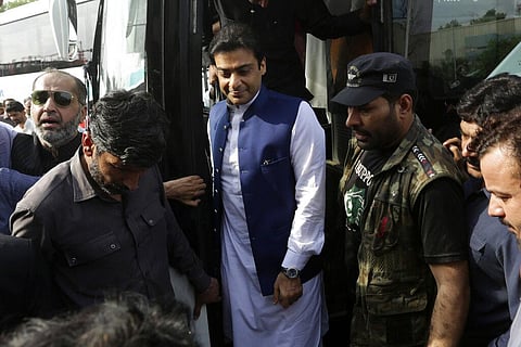 Hamza Sharif, center, sitting chief minister of Pakistan's Punjab province, arrives to vote in provincial assembly, in Lahore, Pakistan. (Photo | AP)