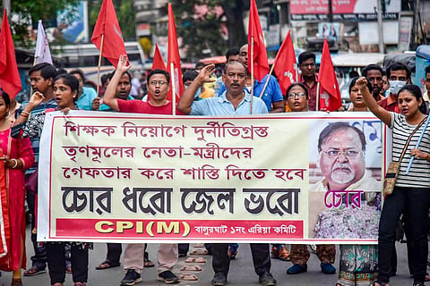 CPI(M) activists stage a protest demanding resignation of West Bengal Chief Minister Mamata Banerjee, following the arrest of Partha Chatterjee in the SSC scam case. (Photo | PTI)