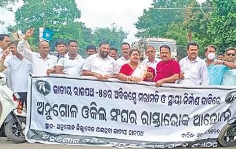 Members of Angul Bar Association blocking NH-55 on Sunday. (Photo | Express)