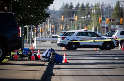 After the shooting began, ambulances and police vehicles converged at a mall. The area was cordoned off with yellow police tape and a major intersection was closed. (Photo | AP)