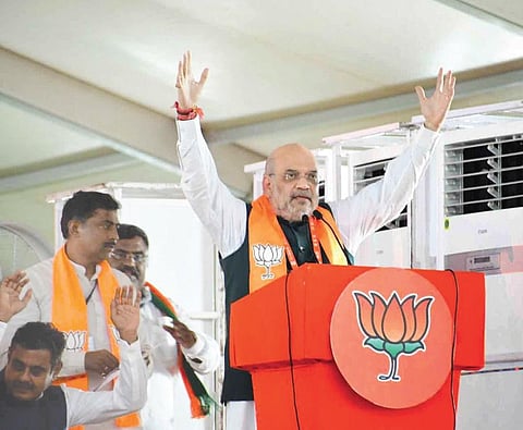 Union Home Minister Amit Shah addresses the Vijay Sankalpa Sabha at Parade Grounds on Sunday